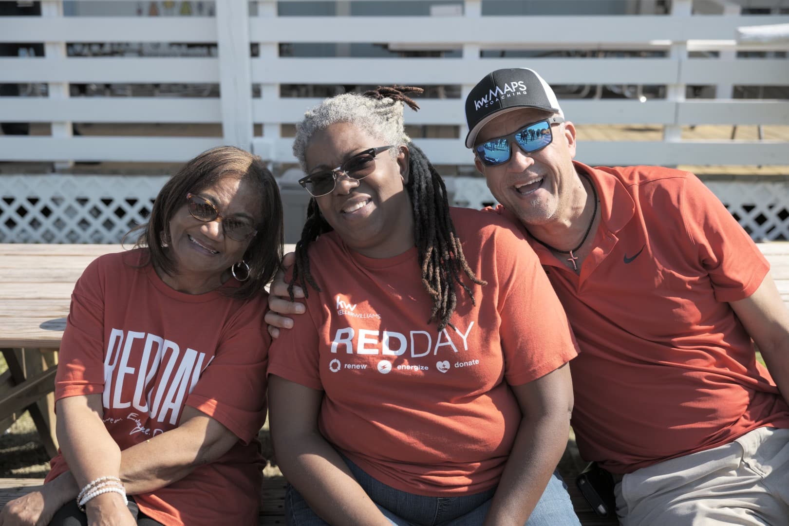 KW Southwest agents in RED Day shirts volunteering together