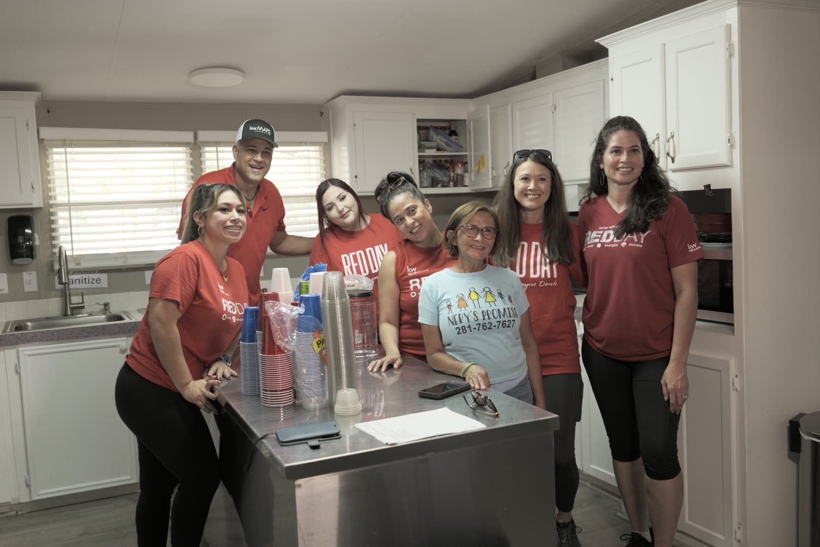 KW Southwest volunteers working in the kitchen at Nery's Promise